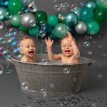 Experienced Portrait Photographer Sussex samphire photography happy twins green grey cake smash splash 2019
