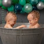 Experienced Portrait Photographer Sussex samphire photography happy twins green grey cake smash splash 2019