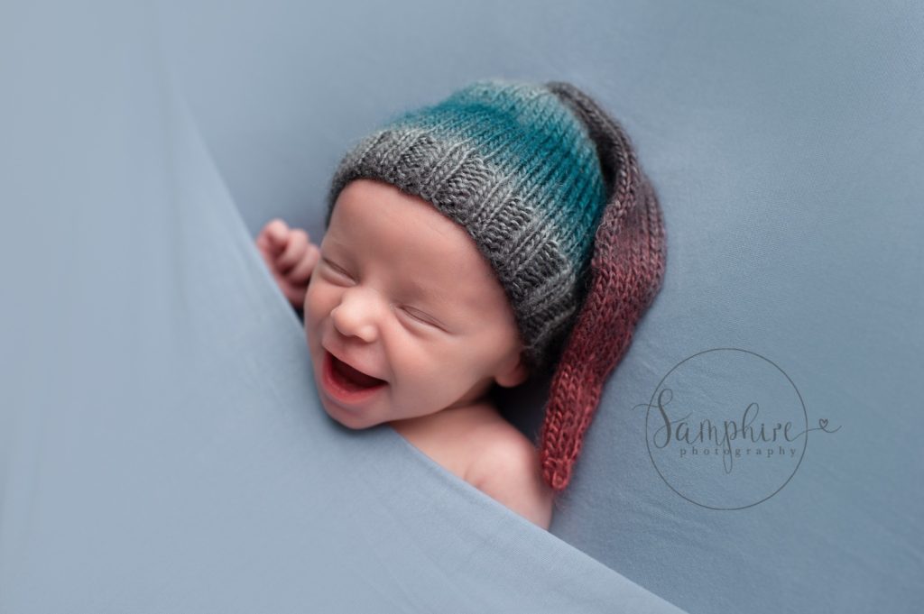 baby photo shoots Newborn baby photography smiling boy knitted hat