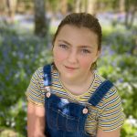 girl in bluebell woods