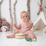 pretty pink woodland cake smash with teepee