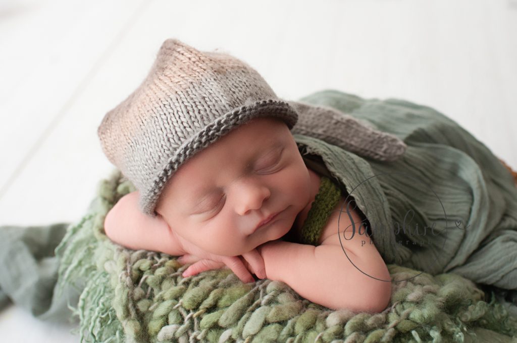 newborn photographer Shoreham studio portrait sleeping boy wearing knitted hat