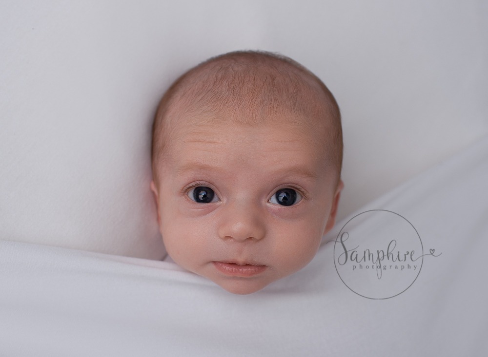 wide awake baby studio portrait