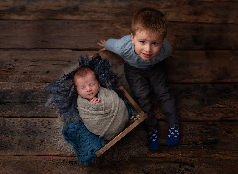 Siblings together during Newborn photoshoot near Cuckfield