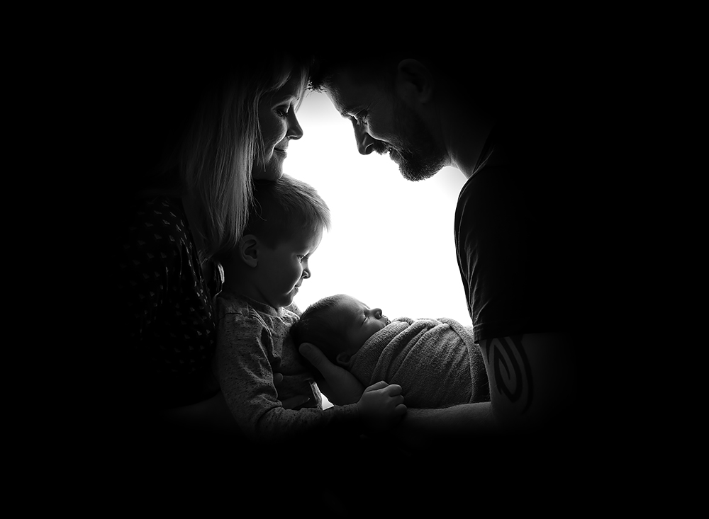 Black and white portrait of family by newborn photographer near Cuckfield, Samphire Photography