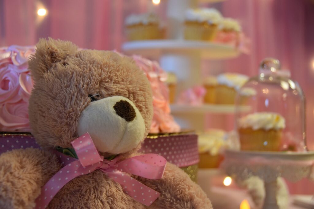 stock photo of teddy bear with pink ribbon