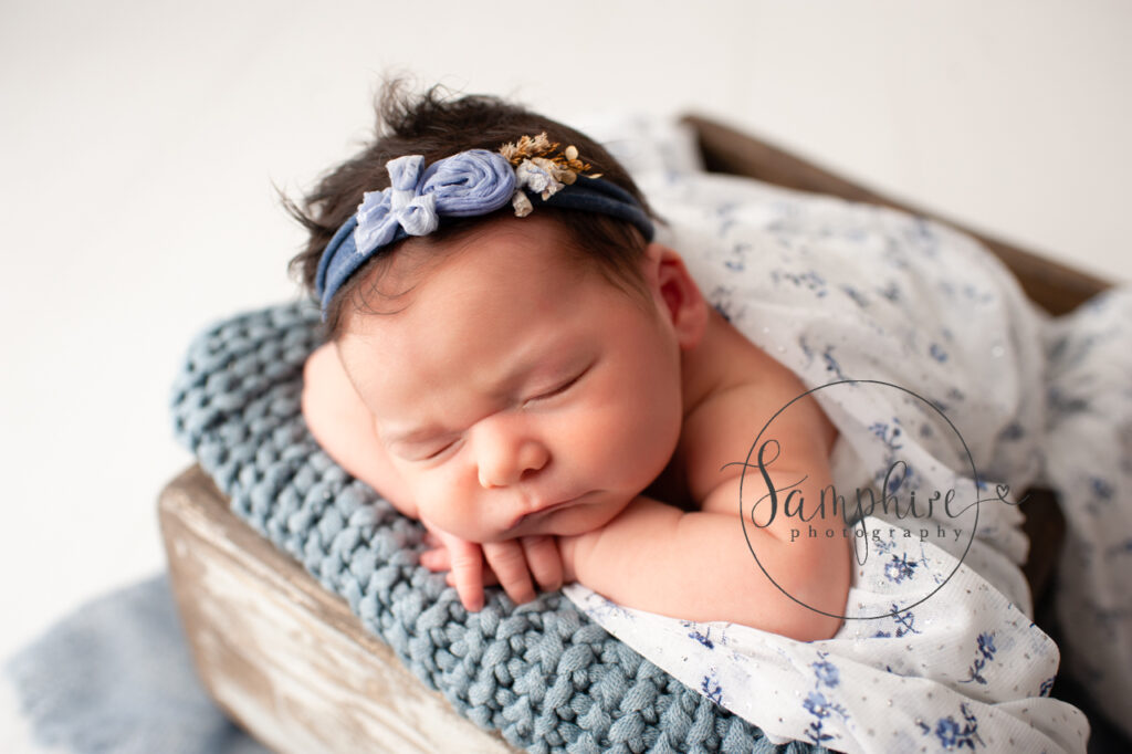 professional photo of sleeping newborn