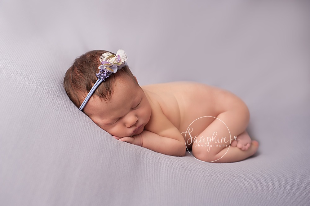 newborn portait baby safety sleeping girl headband lilac