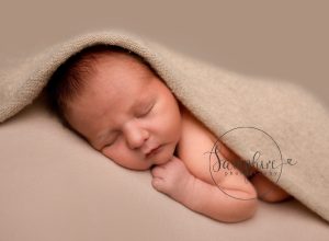 Baby asleep during newborn photoshoot